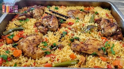 أرز بالدجاج وجبة متكاملة وغنية بالعناصر الغذائية