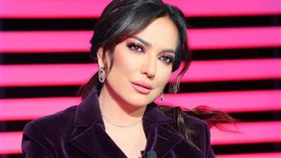 من هي أمل عرفة ؟